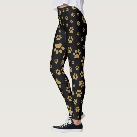 Schattige zwart en oud gouden pootafdrukpatroon af leggings (Links)