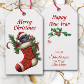 Schattige zwart labrador retriever puppy gluren cadeaulabel