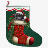 Schattige zwart labrador retriever puppy gluren grote kerstsok (Voorkant)
