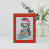 schattige zwarte en bruine puppy ' s op kerst feestdagenkaart (Staand voorkant)