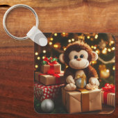 Schattigee aap op een kerstcadeau sleutelhanger (Voorkant)