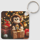 Schattigee aap op een kerstcadeau sleutelhanger (Achterkant)