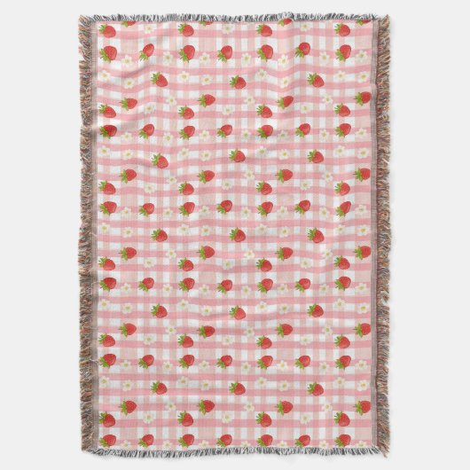 Schattigee aardbeien en bloemen op een roze gingha deken (Voorkant Verticaal)