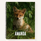 Schattigee Baby Fox in een groen bos Notitieboek (Voorkant)