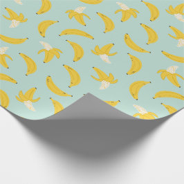 Schattigee bananen op lichtblauw cadeaupapier