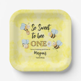 Schattigee bij een geel zwart eerste verjaardagsfe papieren bordje