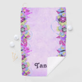 Schattigee bloemen en vlinders op paarse golfhanddoek (Insitu)