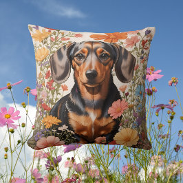 Schattigee bruine teckel en kosmos bloemen kussen