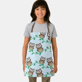 Schattigee bruine uilen op takken blauw schort (Insitu)