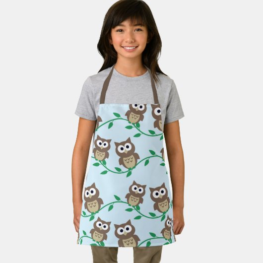 Schattigee bruine uilen op takken blauw schort (Insitu)