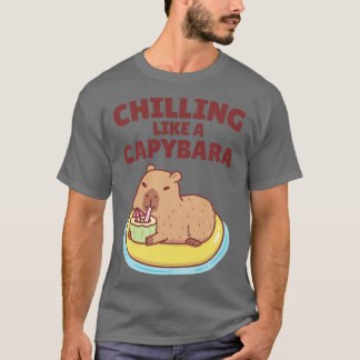 Schattigee capibara op een zwembad zweven als een t-shirt