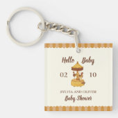 Schattigee carrousel genderneutraal baby shower gu sleutelhanger (voorkant)