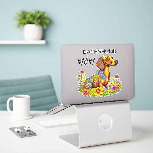 Schattigee Cartoon AI Dachshund Moeder Sticker (Laptop op bureau)