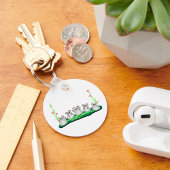 Schattigee Cartoon op gras met bloemen Sleutelhanger