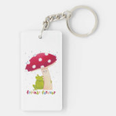 Schattigee cartoon zitkikker en paddenstoel in de sleutelhanger (achterkant)