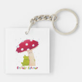 Schattigee cartoon zitkikker en paddenstoel in de sleutelhanger (Achterkant)
