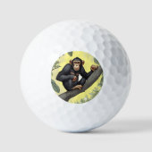 Schattigee chimpansee op de tak begroet golfballen (Voorkant)