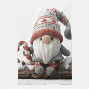 Schattigee Christmas Gnome met een snoepriet op ee Theedoek