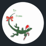 Schattigee Christmas Lizard Gift Label Stickers<br><div class="desc">Deze schattige kleine groene hagedis is uitgedost voor de vakantie met zijn kerstmuts,  snoepriet,  en zelfs een felrood linttij naar zijn verhaal. Perfect voor het labelen van uw kerstcadeaus. "Aan" en "Van" zijn sjablonen die kunnen worden verwijderd of gewijzigd met behulp van de tekstvakken onder "personaliseren".</div>