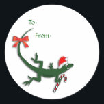 Schattigee Christmas Lizard Gift Label Stickers<br><div class="desc">Deze schattige kleine groene hagedis is uitgedost voor de vakantie met zijn kerstmuts,  snoepriet,  en zelfs een felrood linttij naar zijn verhaal. Perfect voor het labelen van uw kerstcadeaus. "Aan" en "Van" zijn sjablonen die kunnen worden verwijderd of gewijzigd met behulp van de tekstvakken onder "personaliseren".</div>