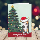 Schattigee Custom Tricolor Corgi in Santa Hat Chri Feestdagen Kaart<br><div class="desc">Deze prachtige driekleur Pembroke Welsh Corgi dog heeft zijn hoofd gekanteld in een schattig Sinterklaas pet. De pup zit voor een  kerstboom versierd met kleurrijke ornamenten. Vrolijk kerstfeest is geschreven op de voorkant in heerlijk cursief op deze huisdier eigenaar vakantie kaart met een prachtige tekening van mijn favoriete doggy.</div>