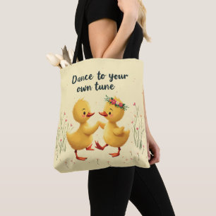 Schattigee dansende eendjes met bloemenlente vibes tote bag