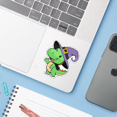 Schattigee Dino Witch Sticker (Laptop met iPhone)