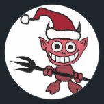 Schattigee duivel draagt Santa Christmas Pet Ronde Sticker<br><div class="desc">Prachtige grappige cartoon duivel met een kerstfeest pet. Leuk en uniek cadeau-idee. Kan ook aangepaste tekst toevoegen en de achtergrondkleur wijzigen bij het bestellen.</div>