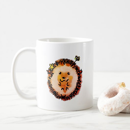 Schattigee egel in herfstbladeren koffiemok (Met donut)