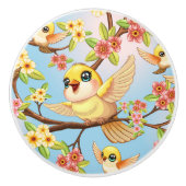 Schattigee en vrolijke vogels tussen de voorjaarsb keramische knop (Voorkant)