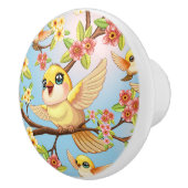 Schattigee en vrolijke vogels tussen de voorjaarsb keramische knop (Rechts)