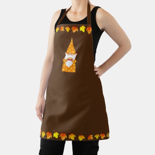 Schattigee Gnome en herfstbladeren op bruin Schort (Insitu)