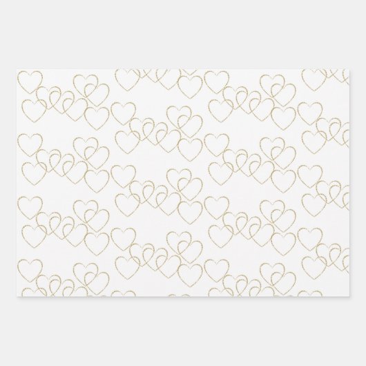 Schattigee gouden en zilveren hart charmes op wit inpakpapier vel (Voorkant)