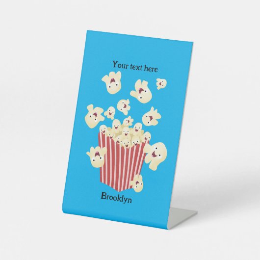 Schattigee grappige springen popcorn cartoon reclamebord met voetstuk (Voorkant)