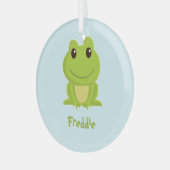 Schattigee groene kikker op blauw glas ornament (Voorkant links)
