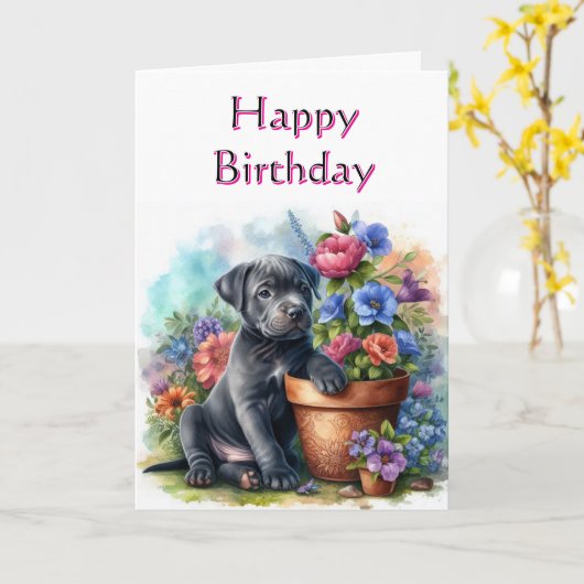 Schattigee Happy Birthday Puppy in Garden Wenskaar Kaart (Gele Bloem)