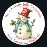 Schattigee Holly Jolly Snowman Custom Christmas Ronde Sticker<br><div class="desc">Deze schattige Kerst stickers zijn voorzien van een schattige  sneeuwman op een rode hoed en groene sjaal,  iedereen een Holly Jolly Christmas toegewenst. Personaliseer door jouw namen toe te voegen. Maakt een schattig vakantie cadeau label!</div>