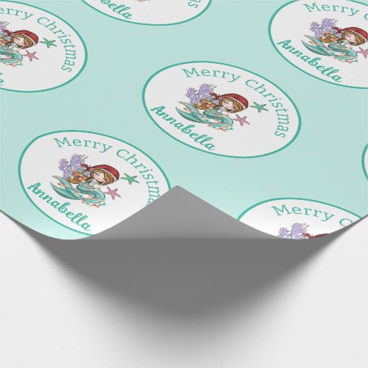 Schattigee Kerst Zeemeermin in Santa Hat op Blauwg Cadeaupapier (Hoek)