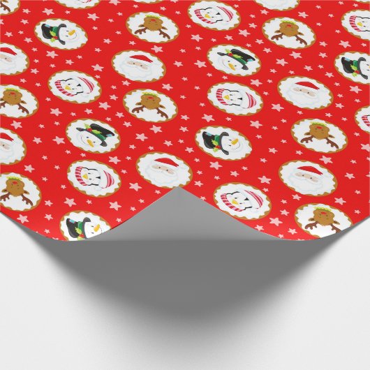 Schattigee kerstkarakters op rood cadeaupapier (Hoek)