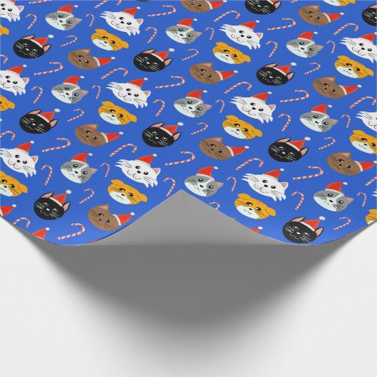 Schattigee kerstkat met patroon cadeaupapier (Hoek)