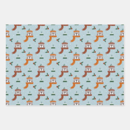 Schattigee kerstkatten in winterbreien lichtblauw inpakpapier vel