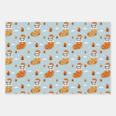 Schattigee kerstkatten in winterbreien lichtblauw inpakpapier vel (Voorkant)