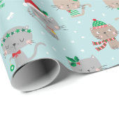 Schattigee kerstkatten op lichtblauw cadeaupapier (Rol Hoek)