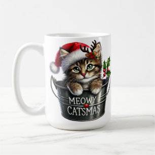SCHATTIGEE KERSTKITTEN IN EEN VAKANTIE TIN CUP KOFFIEMOK