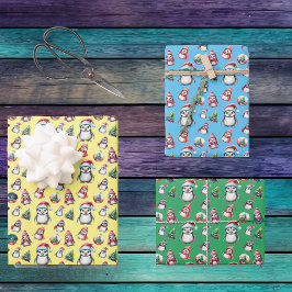 Schattigee kerstpinguïns op geel groen en blauw inpakpapier vel