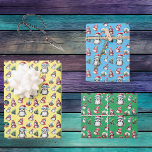 Schattigee kerstpinguïns op geel groen en blauw inpakpapier vel