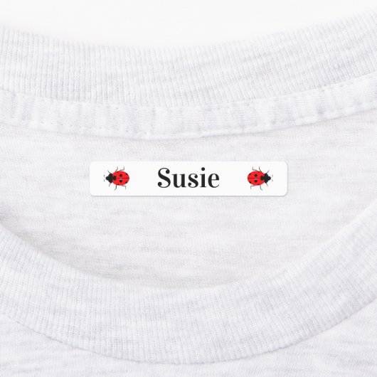 Schattigee kinderlieveheersbeestjes strijken op la labels (Aangebracht)