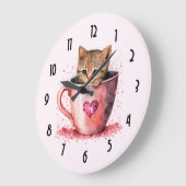 Schattigee kitten in een theekopje met harten grote klok (Hoek)