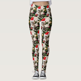 Schattigee kitten spelen met de kerstboomkat leggings