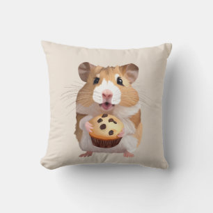 Schattigee kleine hamster met een muffin kussen